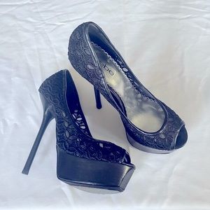 Bebe black lace peep toe platform heels. Size 8.5.